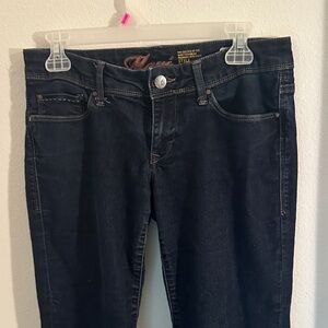 Dark wash super low waisted boot cut jeans